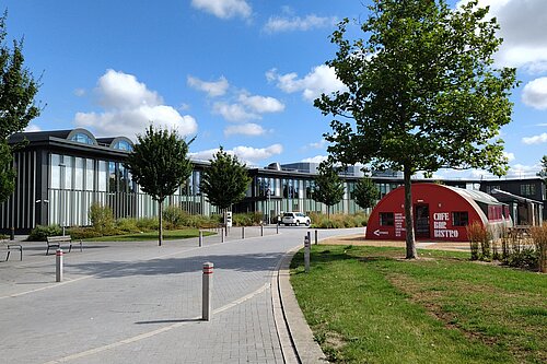 New_Shire_Hall_wideshot_taken_by_Nathan Photo of the exterior of New Shire Hall, Alconbury Weald