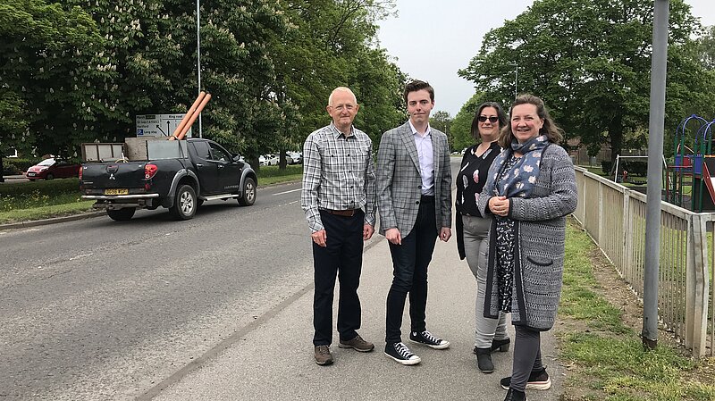 Lib Dem Councillors Nathan, Jo, Graham and Lucy standing by the Huntingdon Ring Road