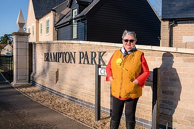Cllr Patricia Jordan by the entrance to Brampton Park