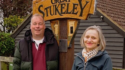 Cllr Tom Sanderson and Cllr Ann Blackwell stood by a sign that reads Great Stukley